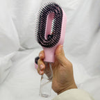 2-in-1 liquid spraying hair brush