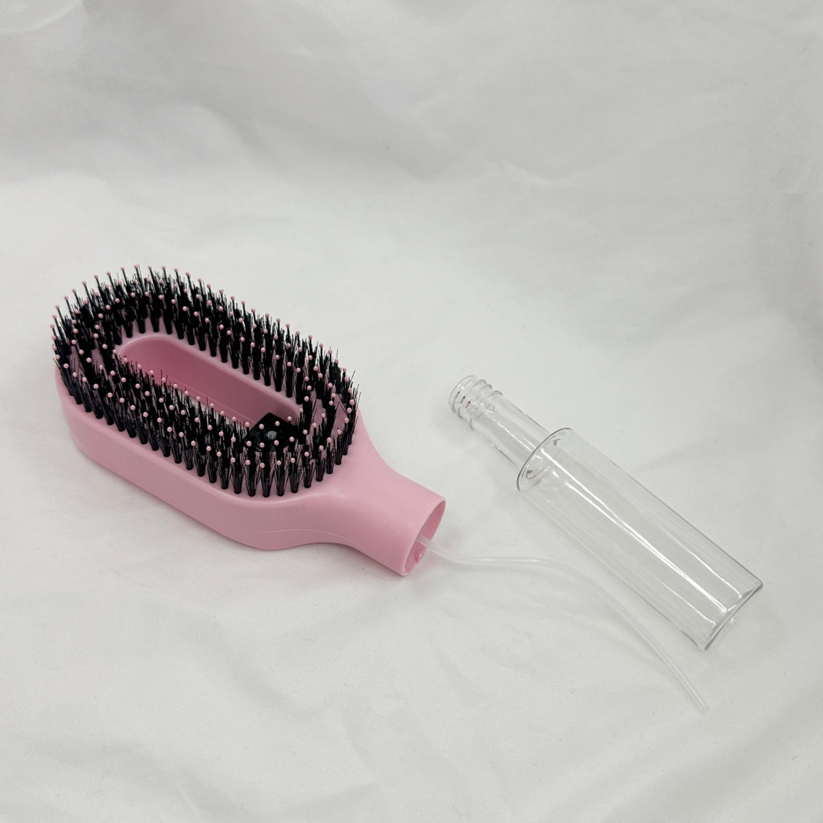 2-in-1 liquid spraying hair brush